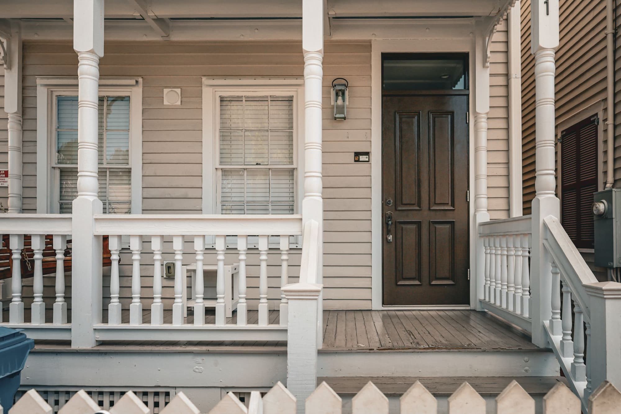 The front door and porch of a family home